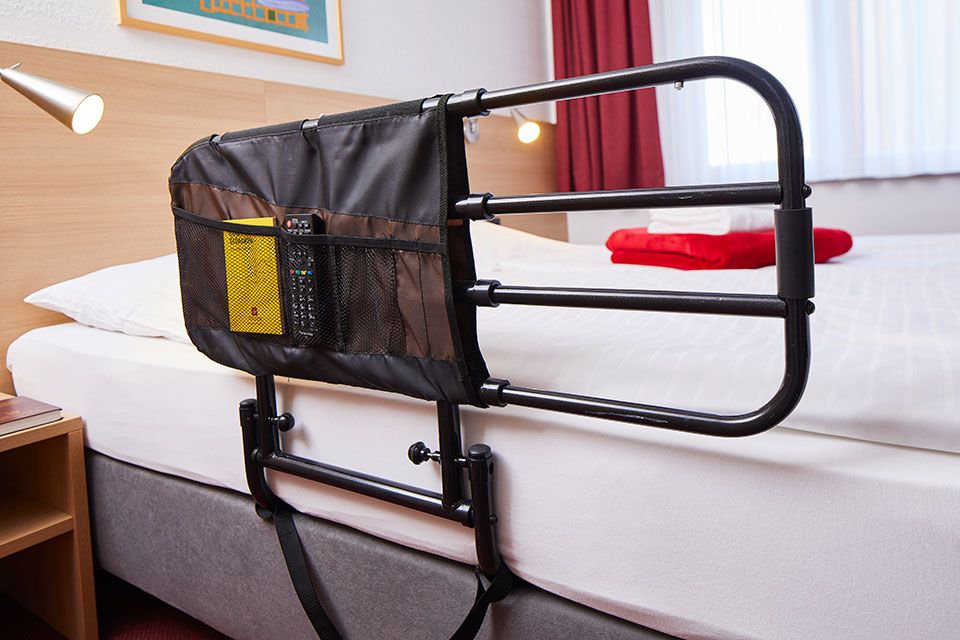 Bed with bed rail